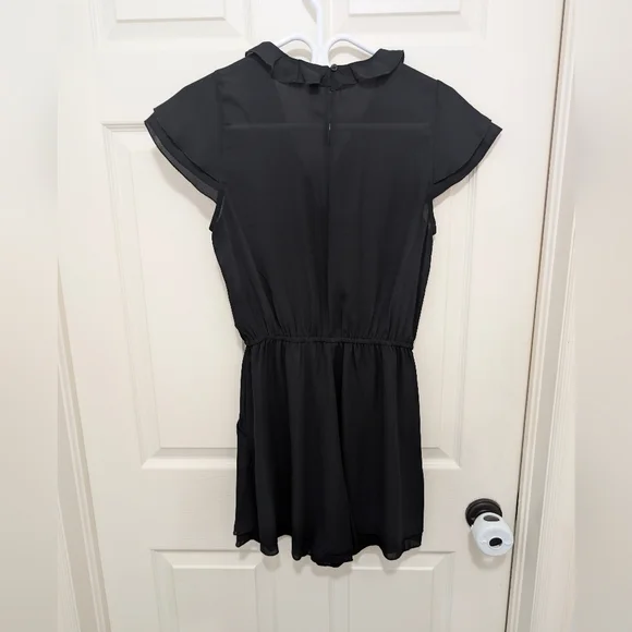 Black Ruffled Short Sleeve Romper - Picture 2 of 3